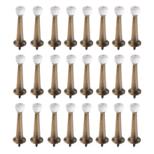 Load image into Gallery viewer, Liberty Premium Door Stop Metal Solid Rigid Door Stopper Brushed 3" (Antique Brass, 24 Pack)
